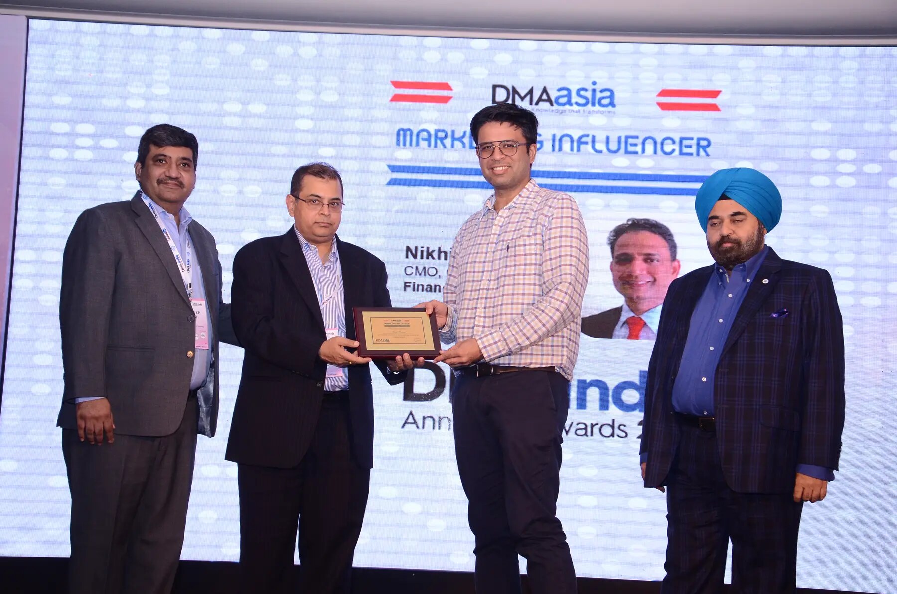Nikhil Rastogi receiving the Marketing Influencer recognition in 2018