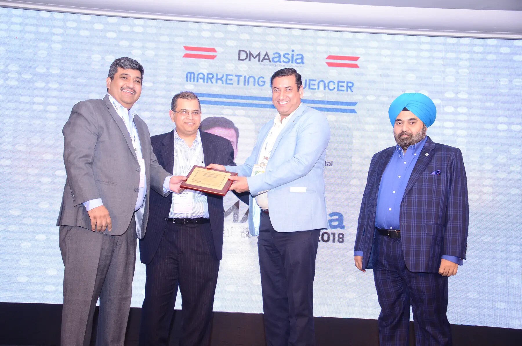 Vishwajeet Parashar receiving the Marketing Influencer recognition in 2018
